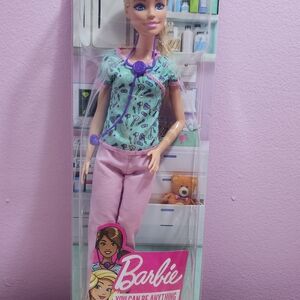 Barbie Careers Fashion Doll & Accessory, Nurse Wearing Printed Top, Pink Pants